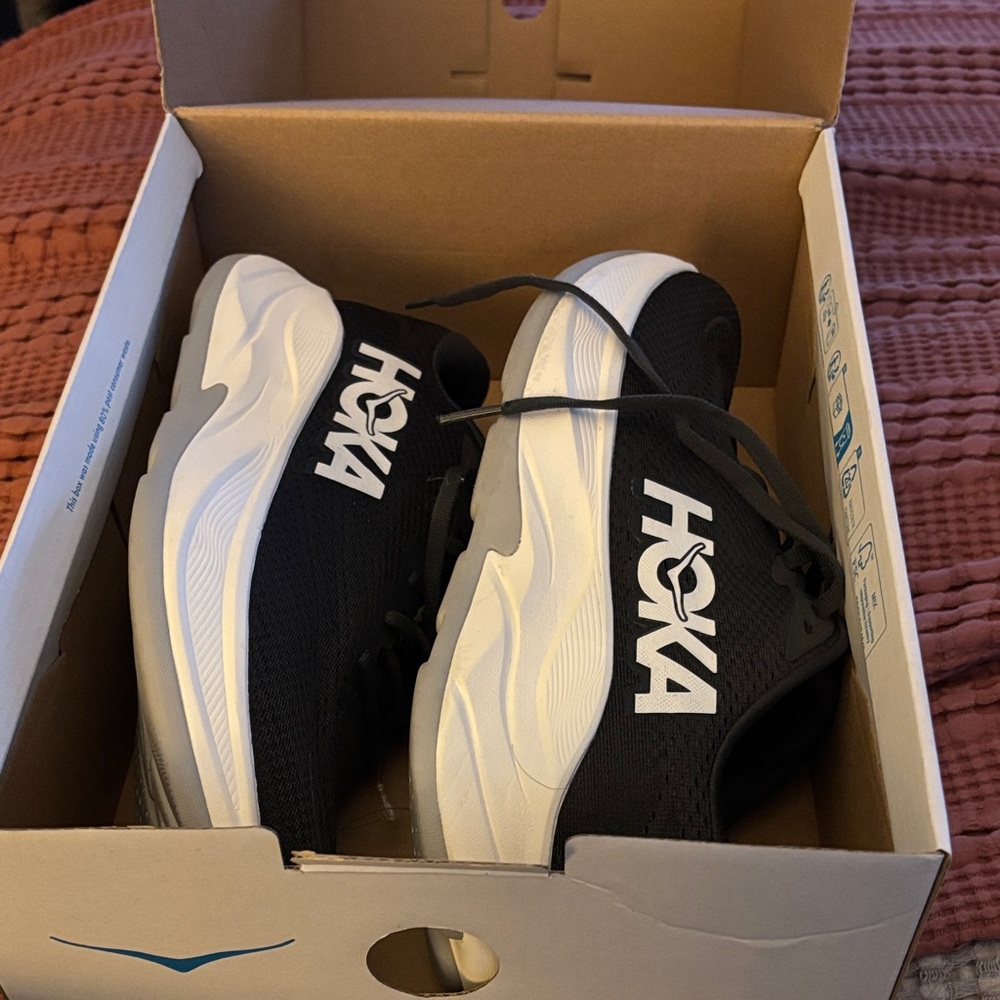 Hoka Rincon 4 Black and White Athletic Shoes maybe tried on .